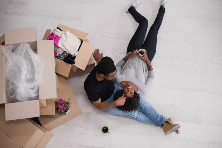 couple with moving boxes